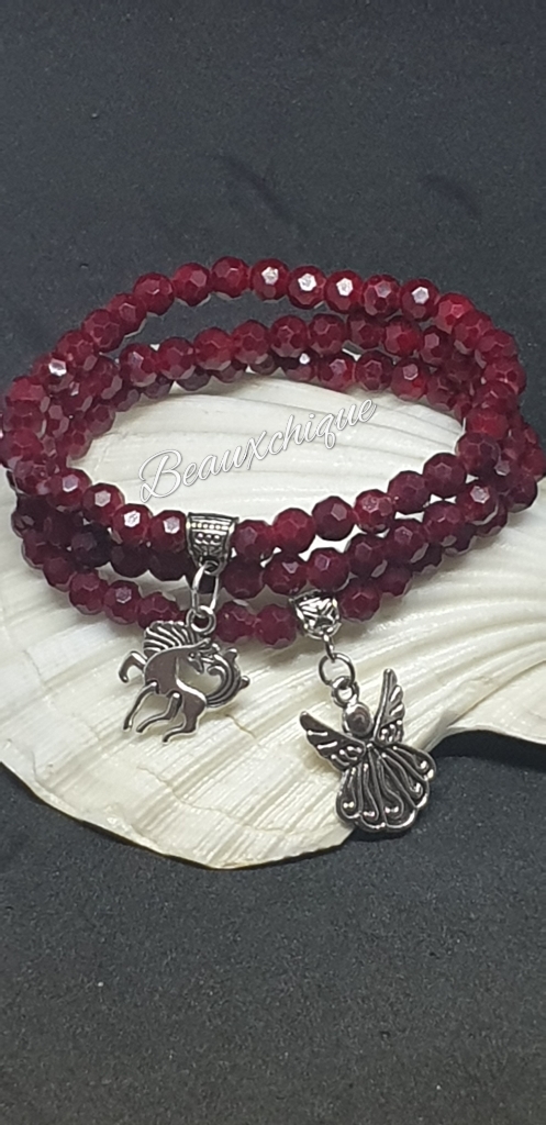 Trio of Elasticated Red Charm Bracelets Trio of Elasticated Red Charm Bracelets