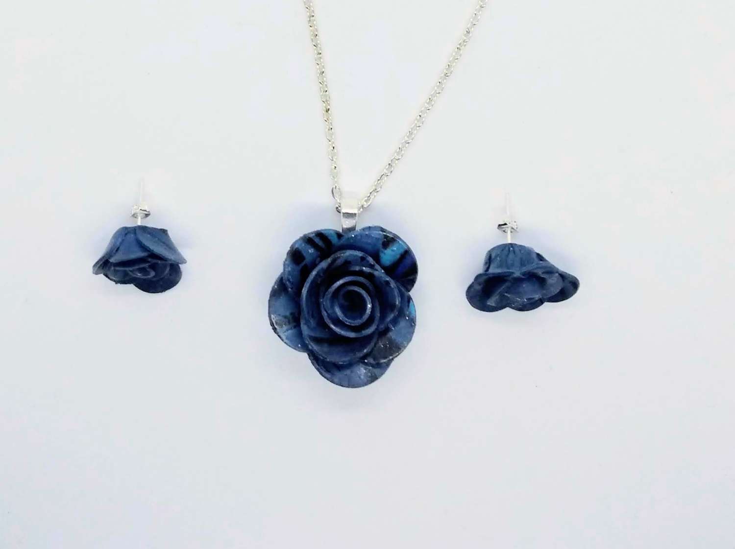 handmade polymer clay rose pendant and earrings in marbled blue handmade polymer clay rose pendant and earrings in marbled blue
