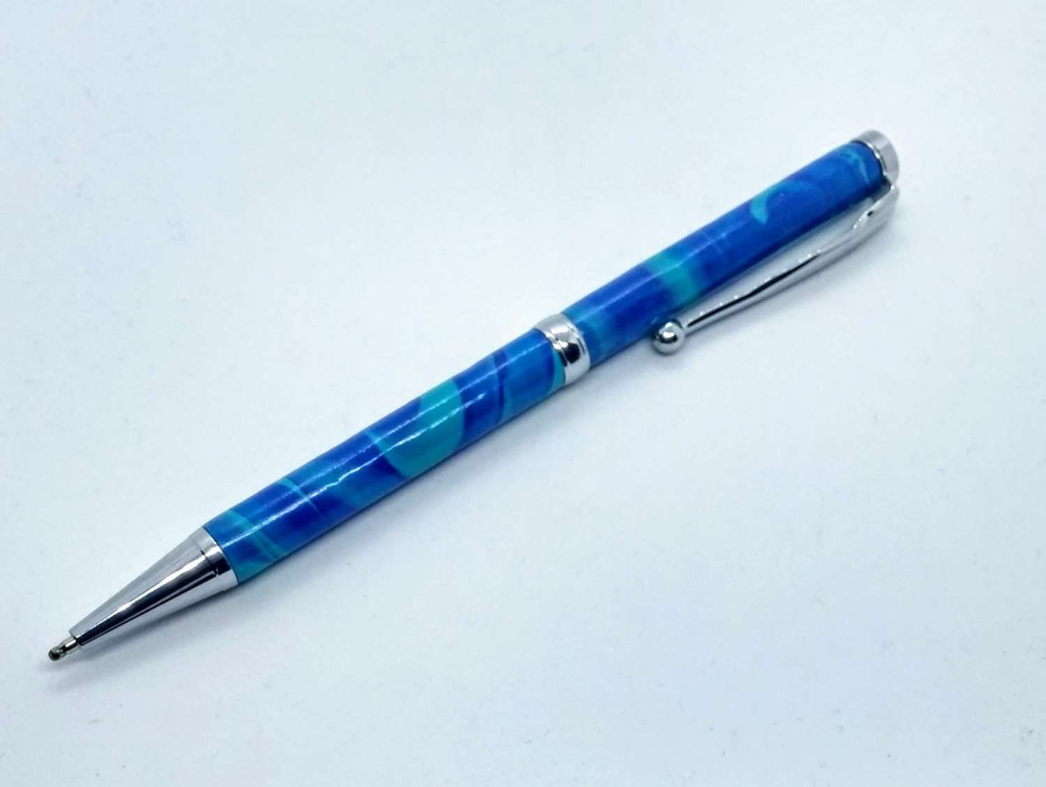 Hand made slimline twist ballpoint pen in bright blue & turquoise Hand made slimline twist ballpoint pen in bright blue & turquoise