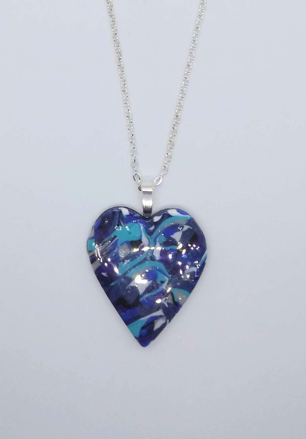 handmade polymer clay headt pendant in turquoise, blues and white handmade polymer clay headt pendant in turquoise, blues and white