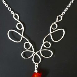 Swirl wire design orange pendant necklace
