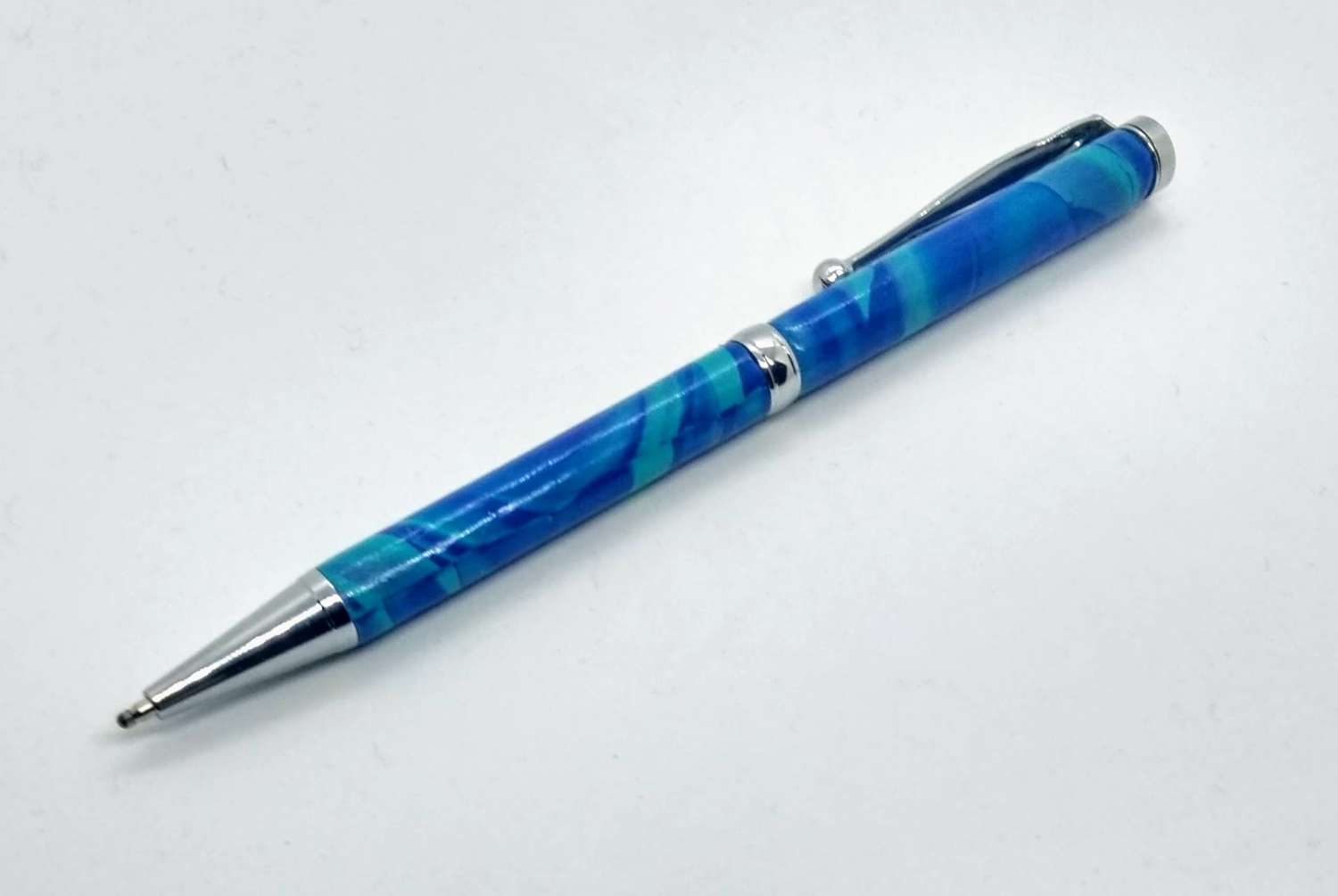 Hand made slimline twist ballpoint pen in bright blue & turquoise Hand made slimline twist ballpoint pen in bright blue & turquoise