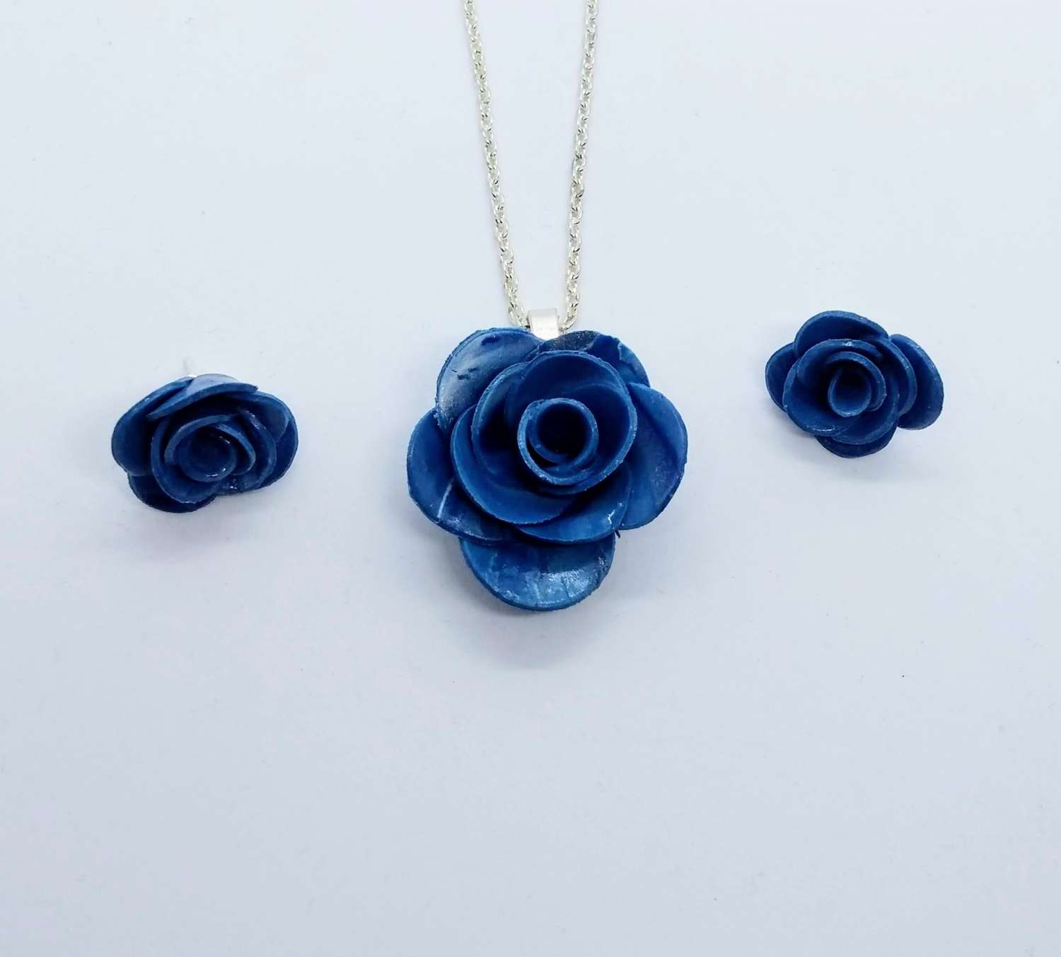 handmade polymer clay rose pendant and earrings in dusty blue handmade polymer clay rose pendant and earrings in dusty blue