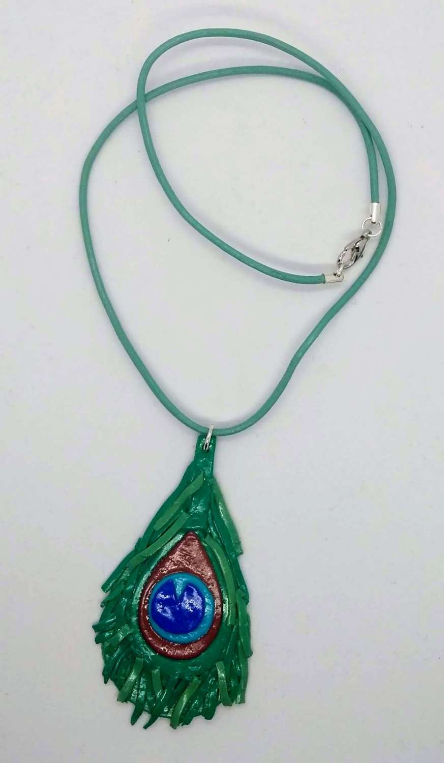 handmade polymer clay peacock feather pendant on leather necklace handmade polymer clay peacock feather pendant on leather necklace
