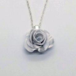 handmade polymer clay rose pendant in white and silver