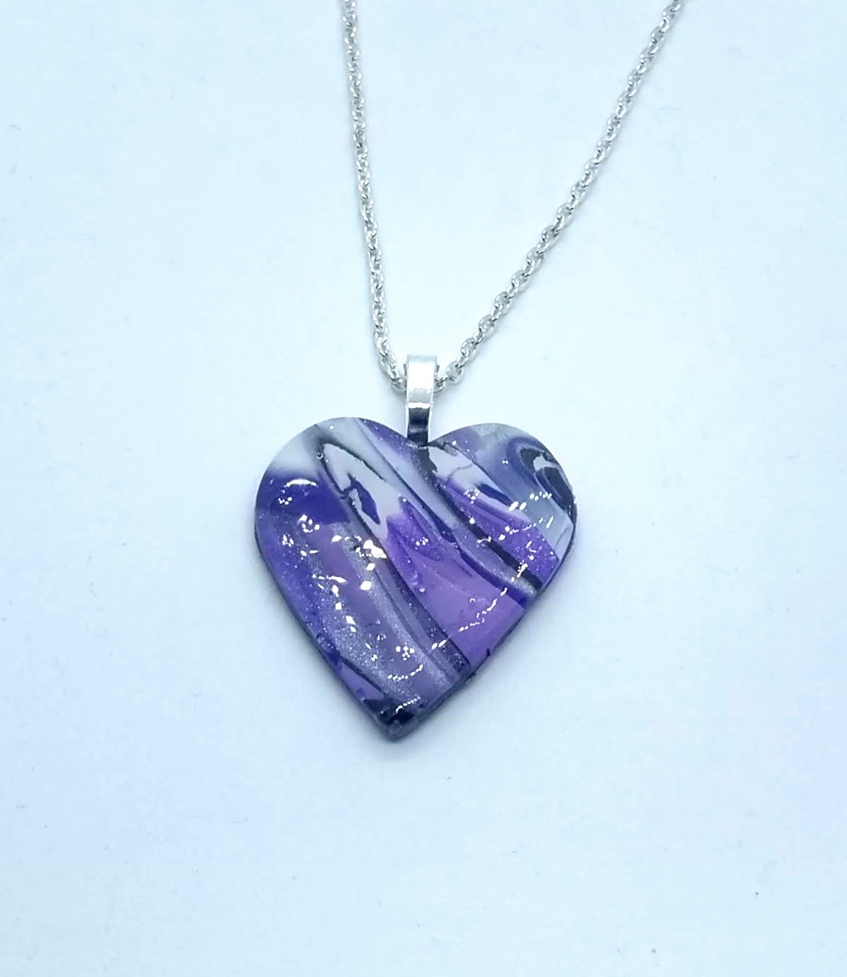handmade polymer clay heart pendant in purples and silver handmade polymer clay heart pendant in purples and silver