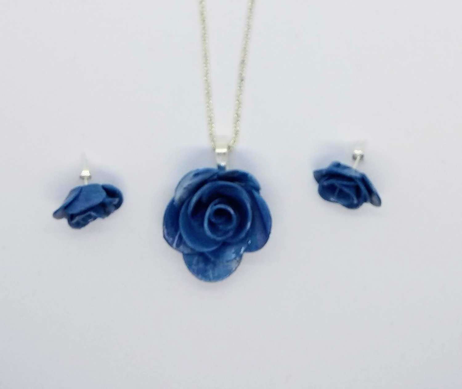 handmade polymer clay rose pendant and earrings in dusty blue handmade polymer clay rose pendant and earrings in dusty blue