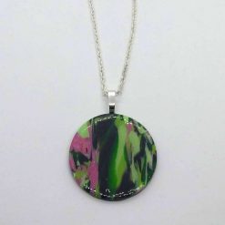 handmade polymer clay round pendant in camouflage khaki green and pink