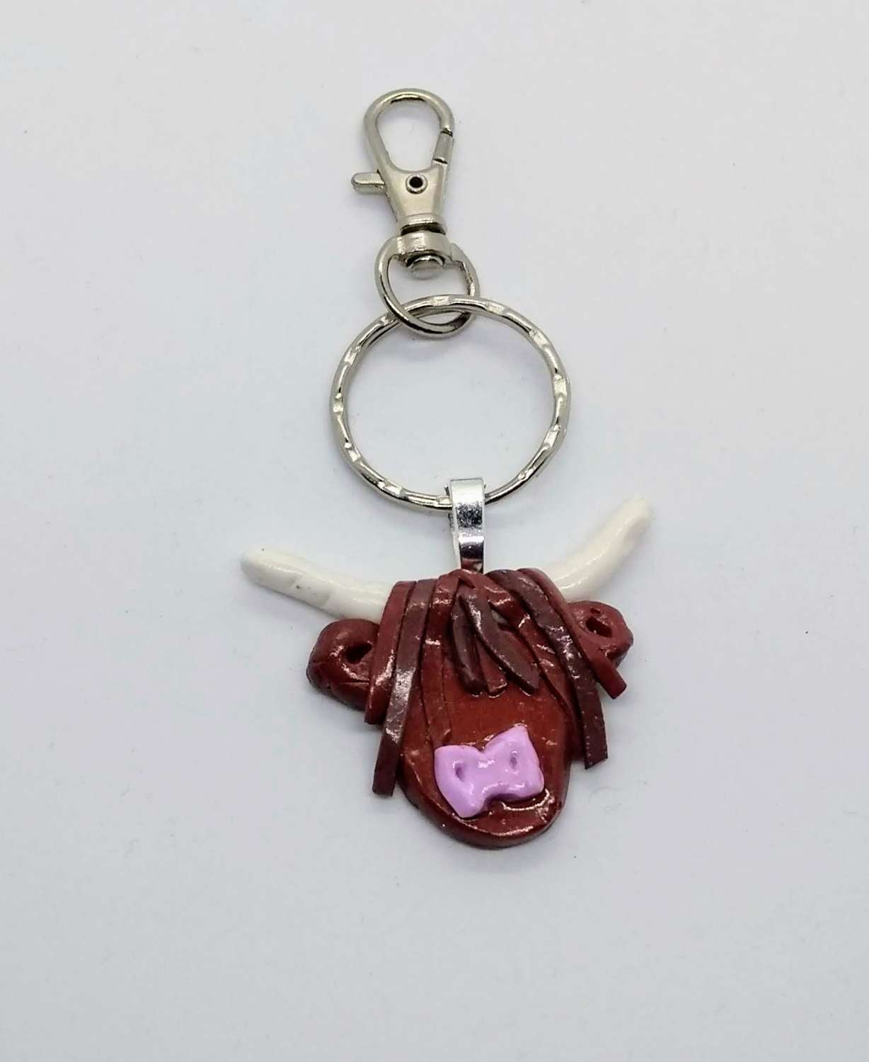 handmade cute polymer clay highland cow pendant or bag clip MadeMe