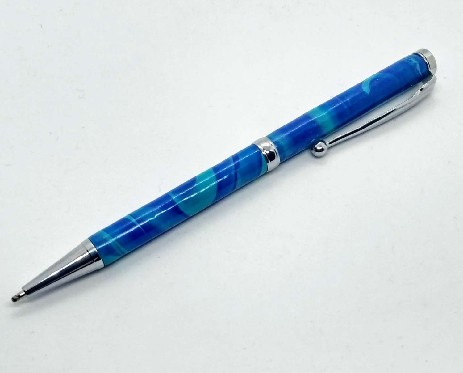 Hand made slimline twist ballpoint pen in bright blue & turquoise Hand made slimline twist ballpoint pen in bright blue & turquoise