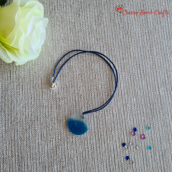 Glittery sea resin pendant necklace