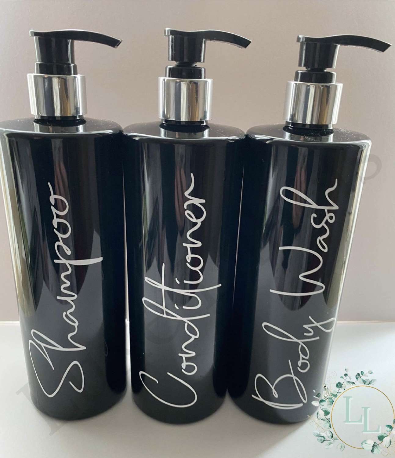 Set of 3 black pump bottles Set of 3 black pump bottles
