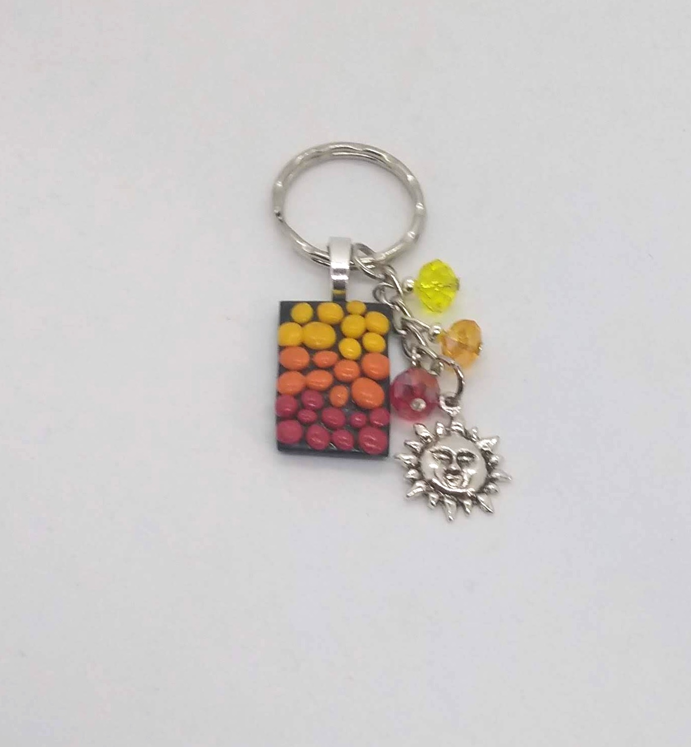 Here comes the sun. Red, orange & yellow polymer clay pebbles sunrise keyring/bag charm Here comes the sun. Red, orange & yellow polymer clay pebbles sunrise keyring/bag charm