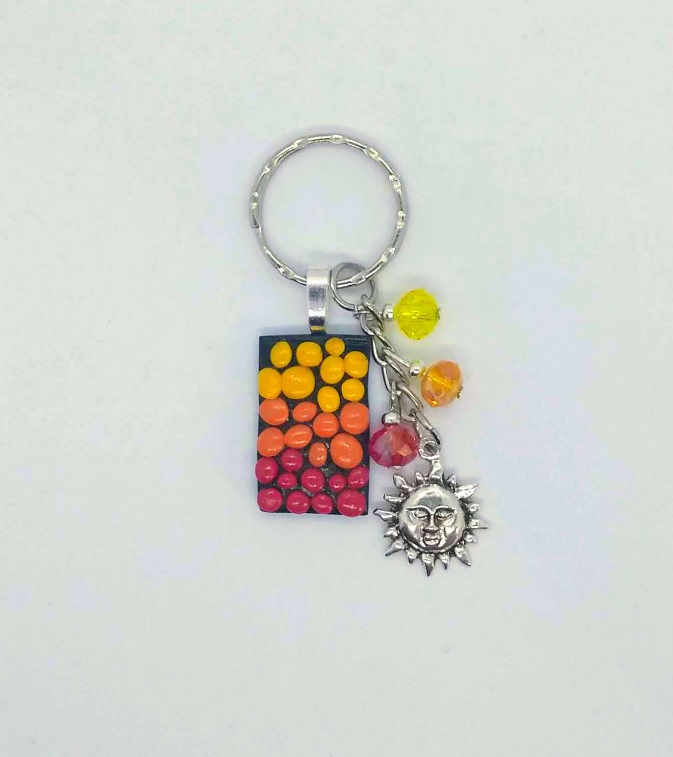 Here comes the sun. Red, orange & yellow polymer clay pebbles sunrise keyring/bag charm Here comes the sun. Red, orange & yellow polymer clay pebbles sunrise keyring/bag charm