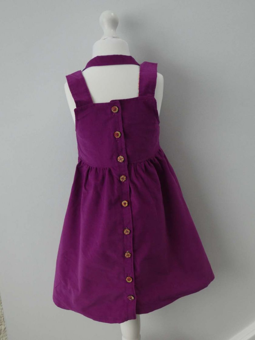 Little girls purple pinafore dress and 