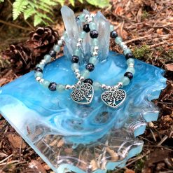A pale green Aventurine beaded bracelet with Tree of Life Charm