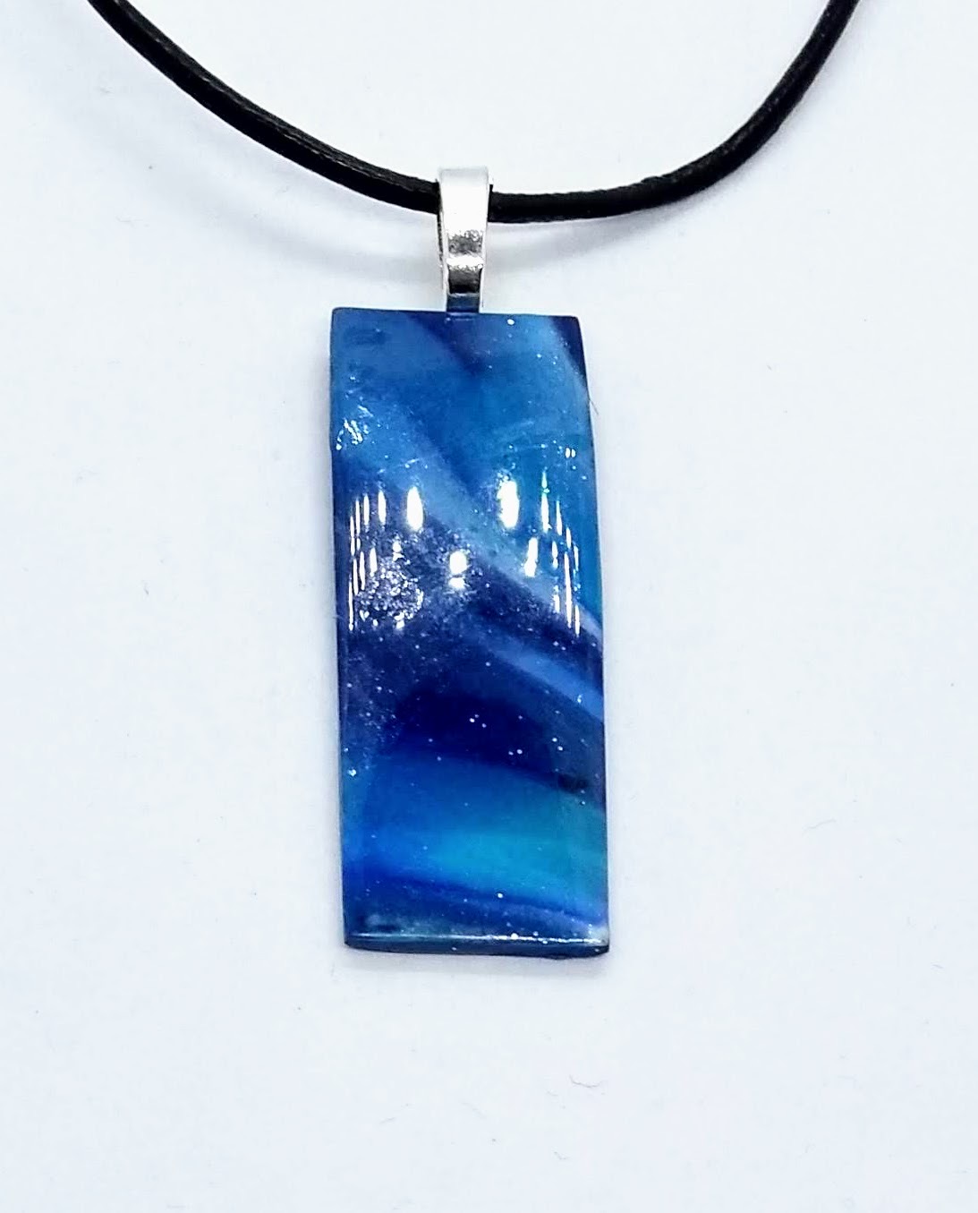 Swirly blue long necklace set in blue and turquoise Swirly blue long necklace set in blue and turquoise