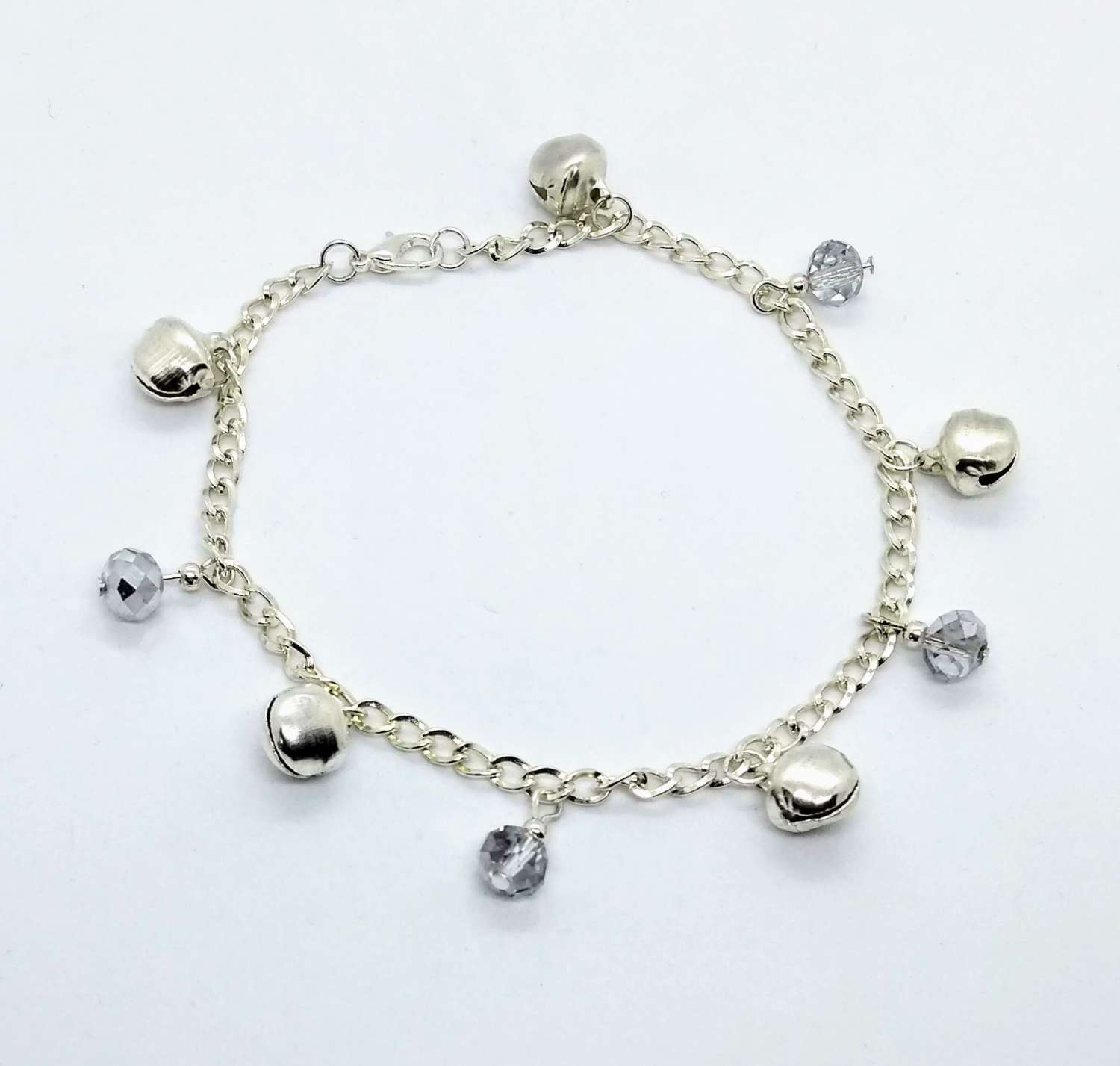 Jingle bells. Bell and silvery drops anklet Jingle bells. Bell and silvery drops anklet