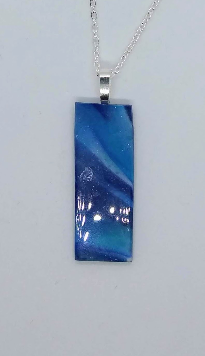 Swirly blue long necklace set in blue and turquoise Swirly blue long necklace set in blue and turquoise