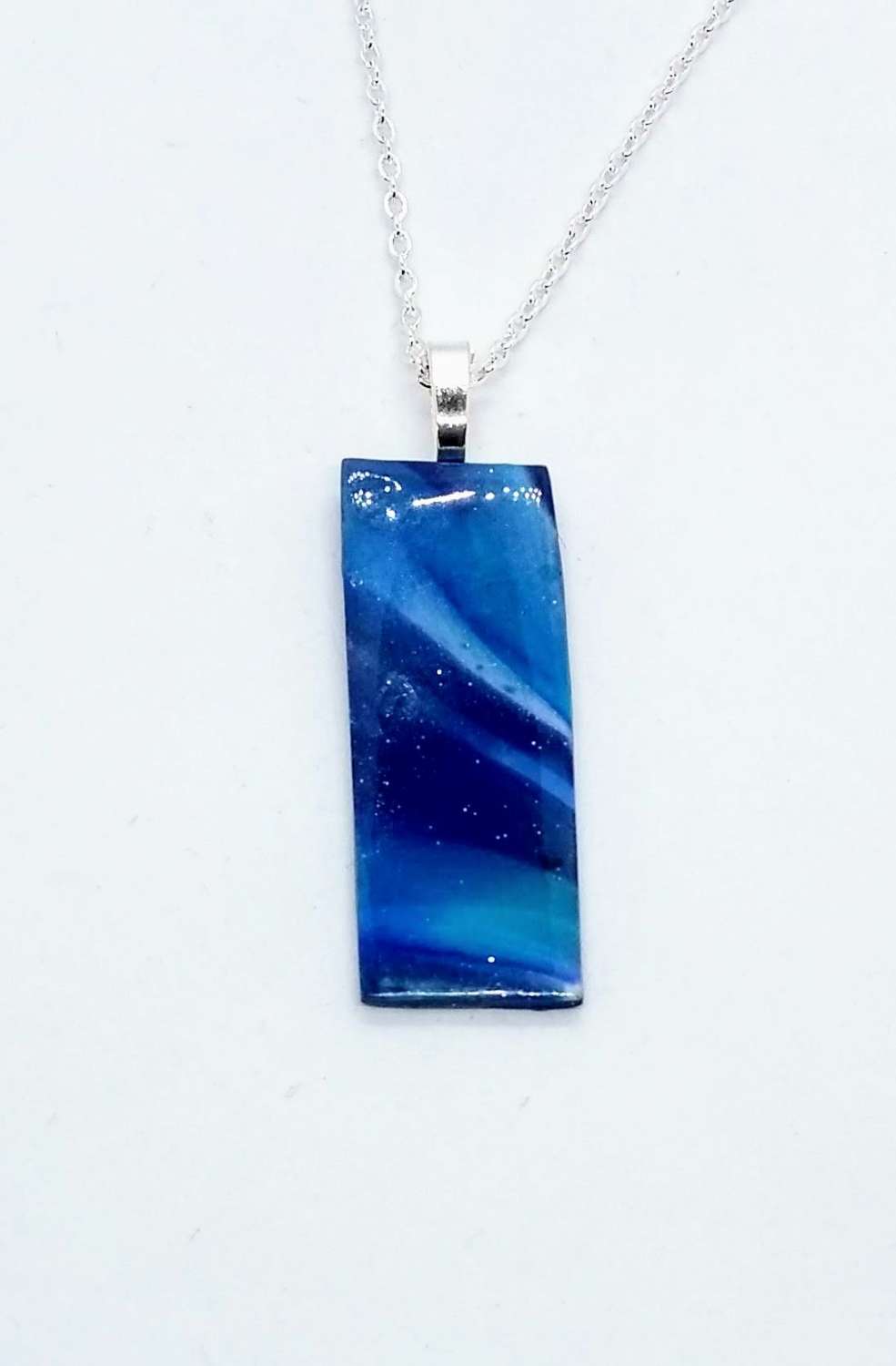 Swirly blue long necklace set in blue and turquoise Swirly blue long necklace set in blue and turquoise