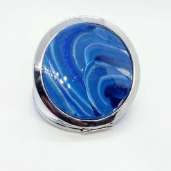 Compact mirror with blue circular swirly design 2
