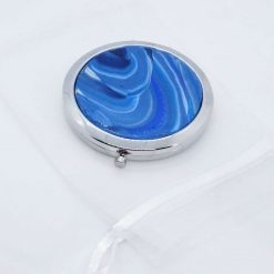 Compact mirror with blue circular swirly design 3