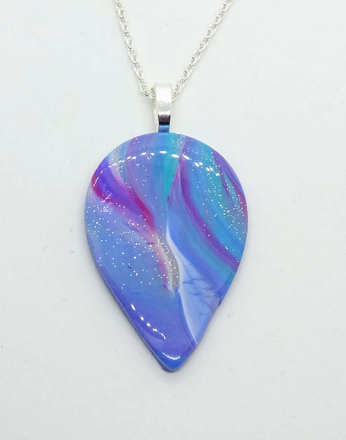 Swirly teardrop pendant in teal, sky blue and pink Swirly teardrop pendant in teal, sky blue and pink