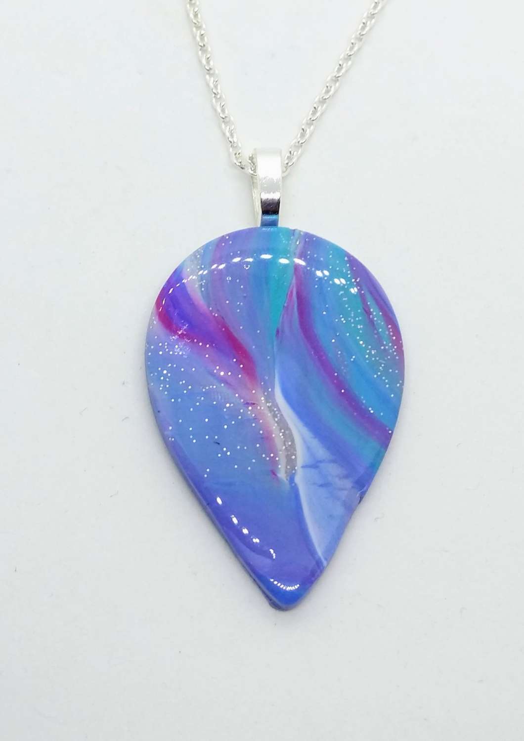 Swirly teardrop pendant in teal, sky blue and pink Swirly teardrop pendant in teal, sky blue and pink