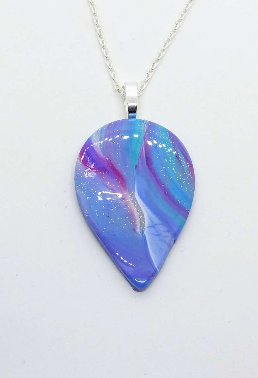 Swirly teardrop pendant in teal, sky blue and pink Swirly teardrop pendant in teal, sky blue and pink