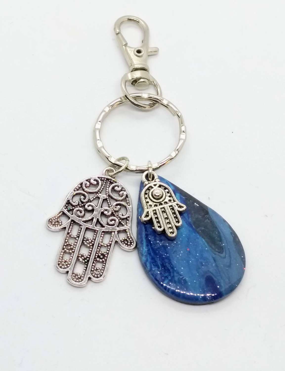 handmade blue teardrop keychain with hamsa hand charm handmade blue teardrop keychain with hamsa hand charm