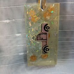 White glittery keyring with truck