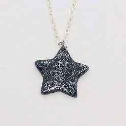 Sparkly night sky. Handmade black polymer clay star pendant with Sparkle