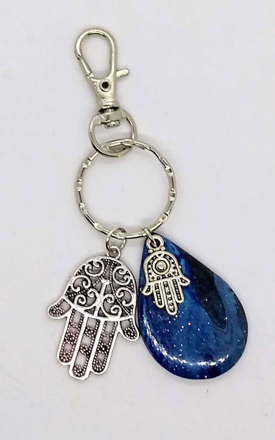 handmade blue teardrop keychain with hamsa hand charm handmade blue teardrop keychain with hamsa hand charm