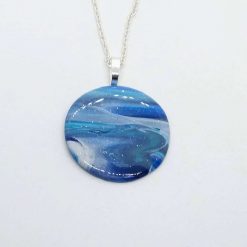 Sea scape. Roubd pendant in shades of blue