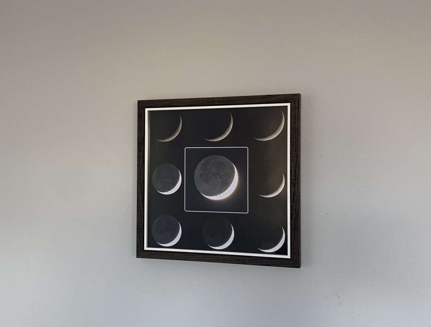 Crescent moon earth shine framed print Crescent moon earth shine framed print