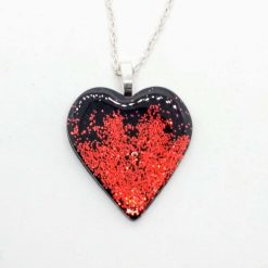 Handmade black polymer clay heart pendant set with red Sparkle