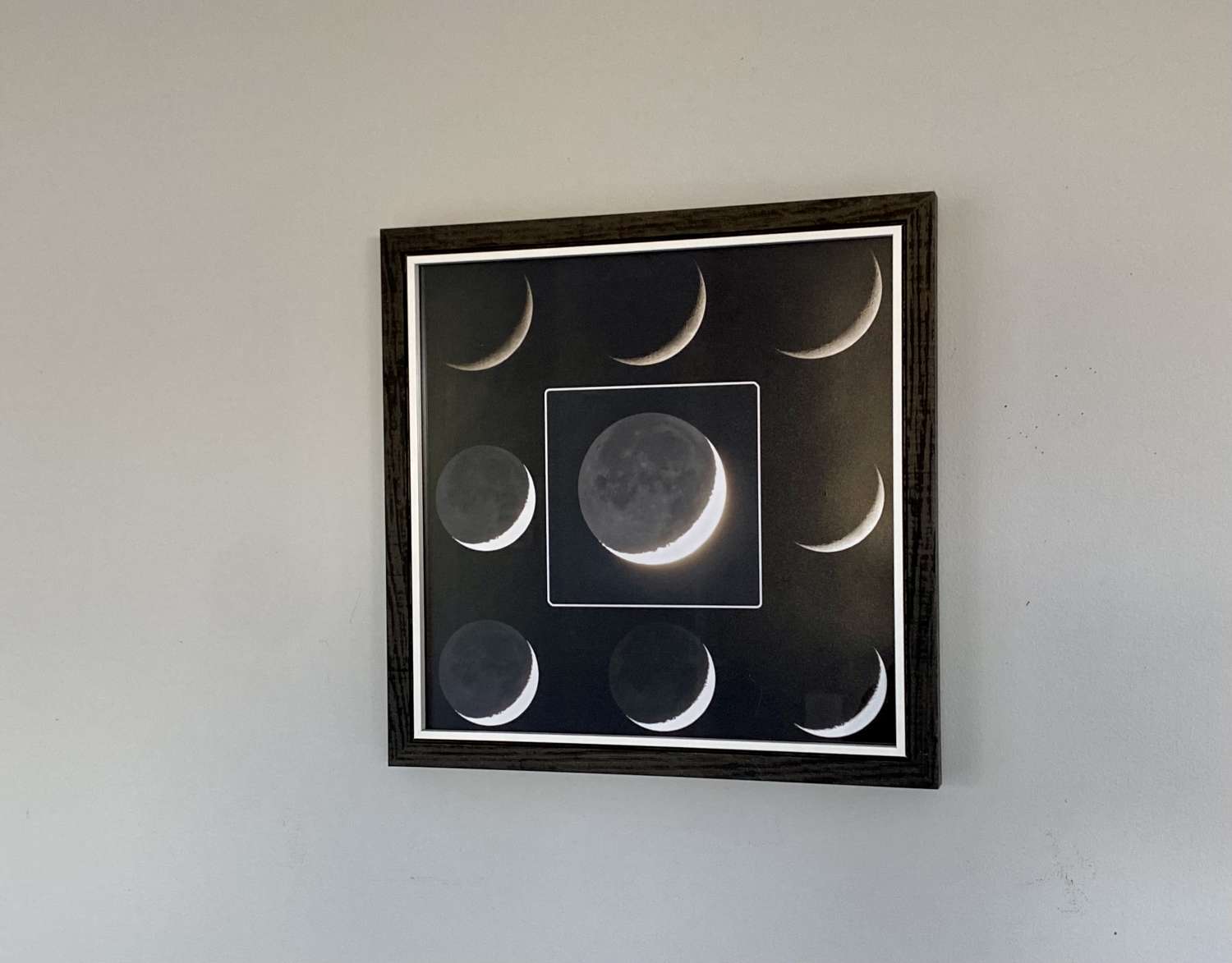 Crescent moon earth shine framed print Crescent moon earth shine framed print