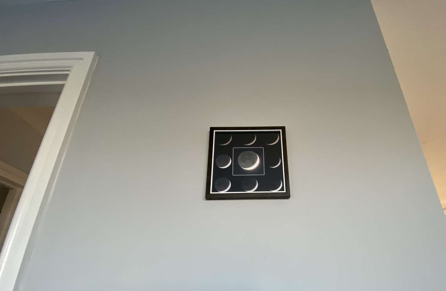 Crescent moon earth shine framed print Crescent moon earth shine framed print