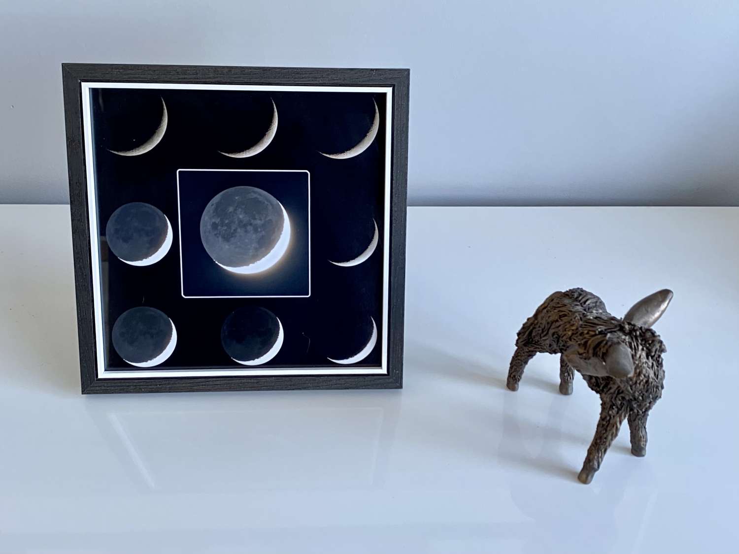 Crescent moon earth shine framed print Crescent moon earth shine framed print