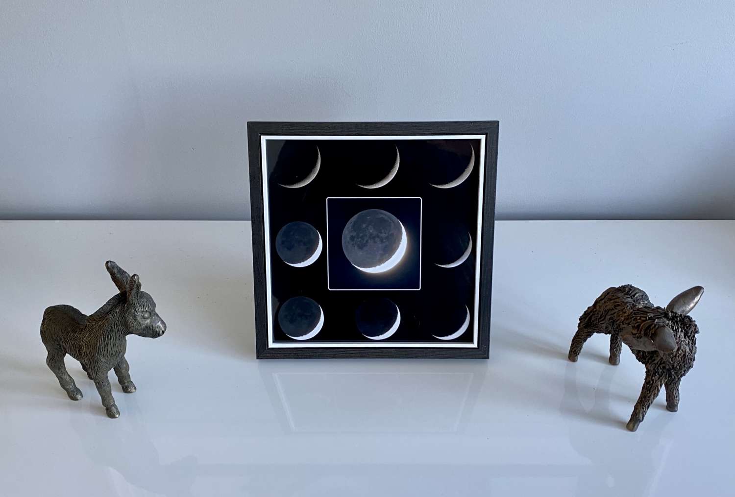 Crescent moon earth shine framed print Crescent moon earth shine framed print