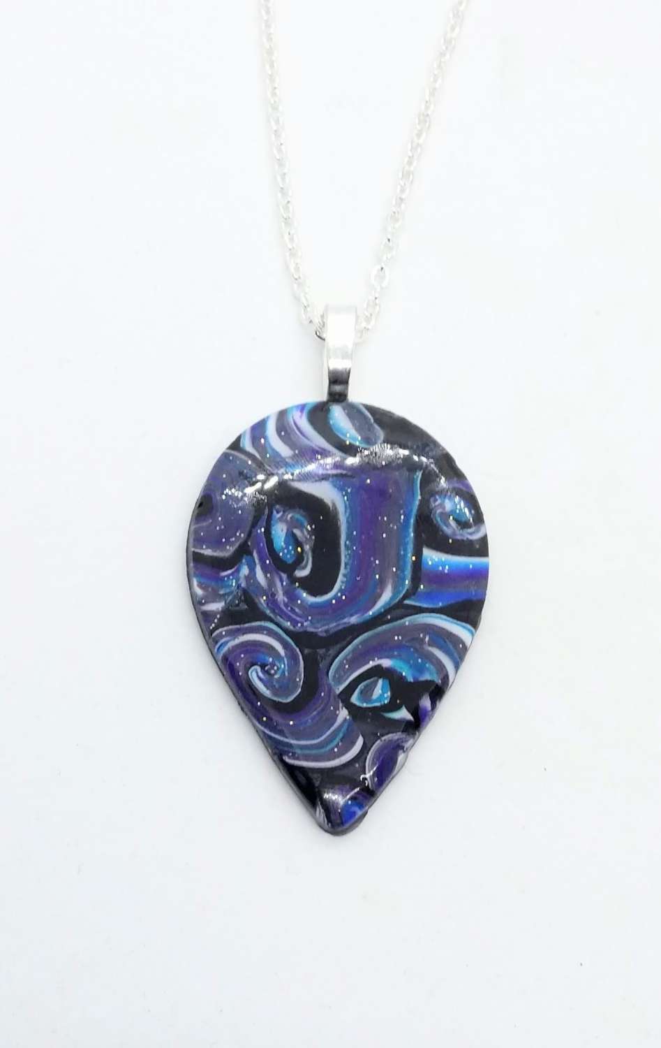 Swirly teardrop pendant in dramatic shades of blue, purple and black Swirly teardrop pendant in dramatic shades of blue, purple and black