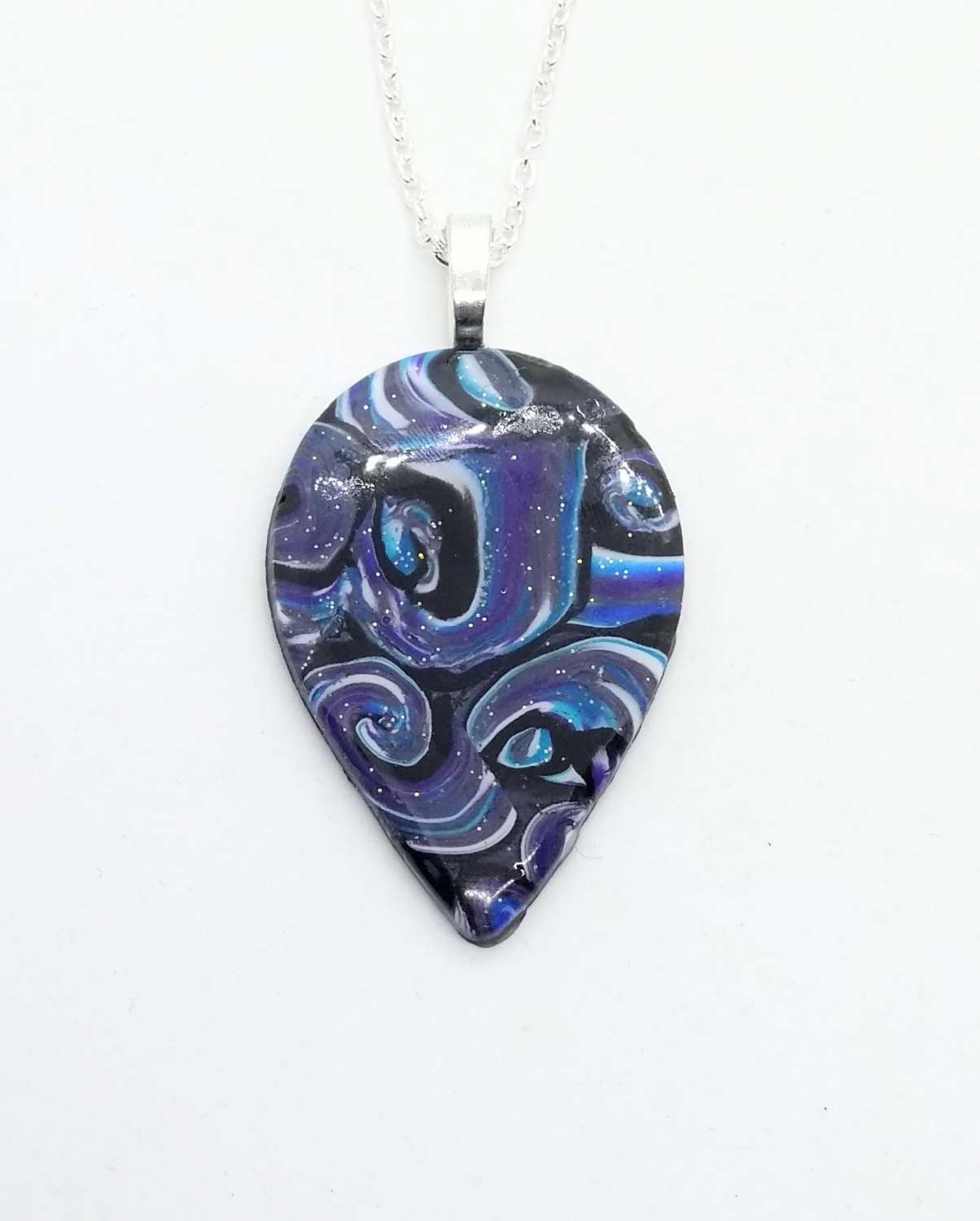 Swirly teardrop pendant in dramatic shades of blue, purple and black Swirly teardrop pendant in dramatic shades of blue, purple and black