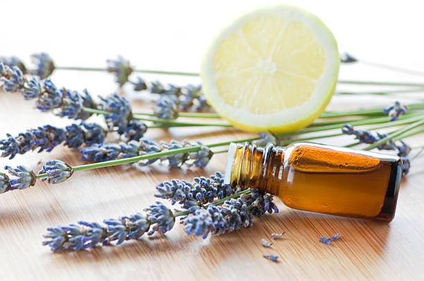 Still life with essential oil bottle, lavender flowers and lemon Lemon & Lavender Wax Melt-Four Cavity Clamshell 1