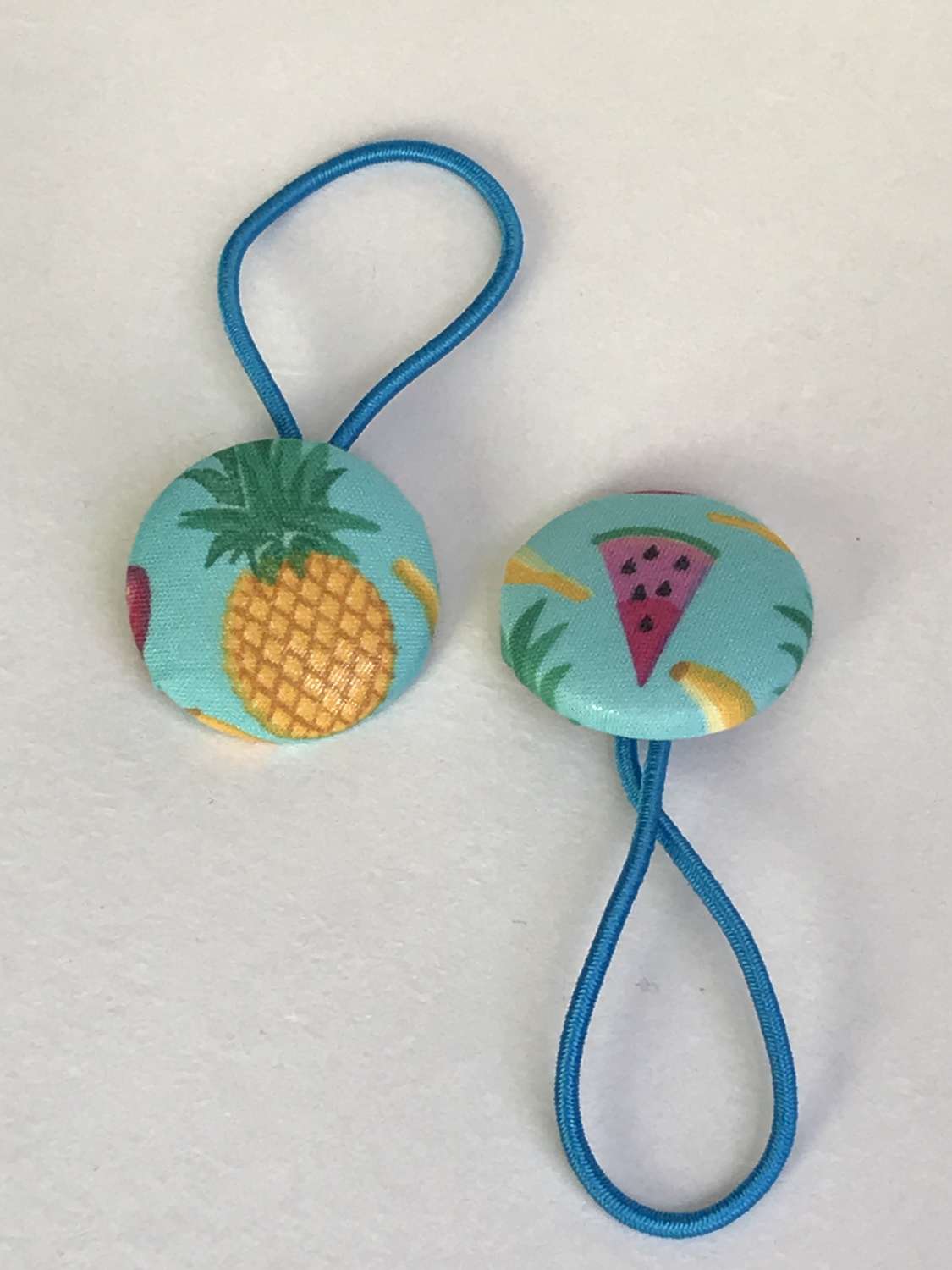 0CC285C8-CCB0-4B59-85AA-A26002CF3F70 Handmade tropical fruit print button bobbles - pink, green & white 1