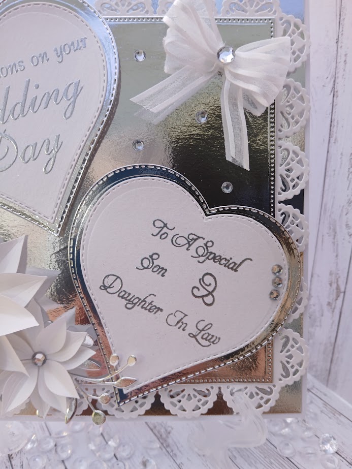Luxury Handmade Keepsake Wedding Card - White & Silver, 8"x8" 'Congratulations on your wedding day, to a special son & daughter in law' Luxury Handmade Keepsake Wedding Card - White & Silver, 8"x8" 'Congratulations on your wedding day, to a special son & daughter in law'