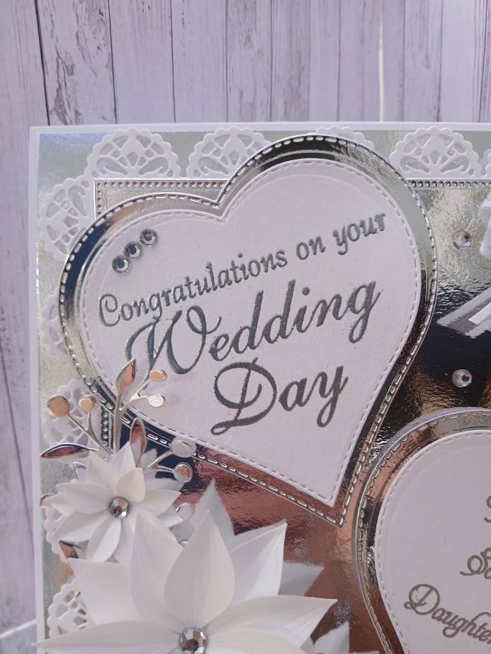 Luxury Handmade Keepsake Wedding Card - White & Silver, 8"x8" 'Congratulations on your wedding day, to a special son & daughter in law' Luxury Handmade Keepsake Wedding Card - White & Silver, 8"x8" 'Congratulations on your wedding day, to a special son & daughter in law'