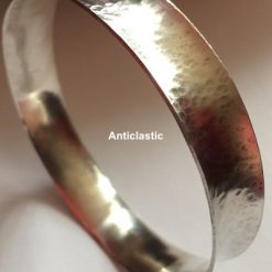 E - Sterling Silver Anticlastic Bangle - 10mm Wide