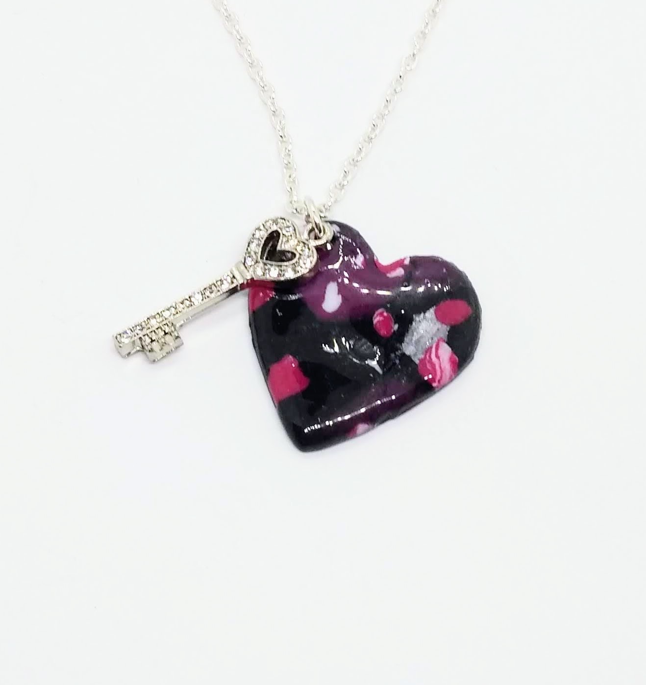 The key to my heart. handmade polymer clay heart pendant on black, pink and silver The key to my heart. handmade polymer clay heart pendant on black, pink and silver