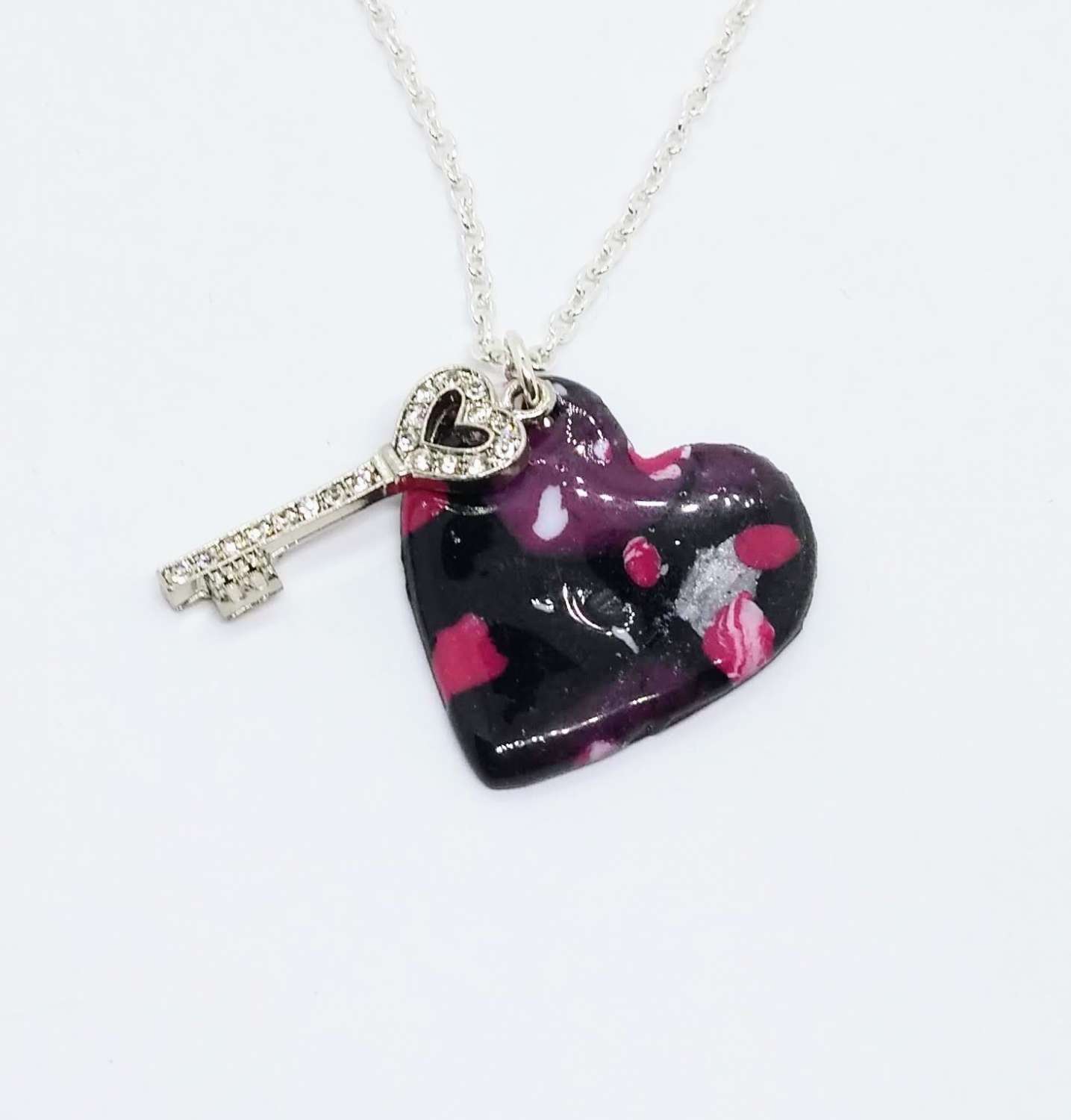 The key to my heart. handmade polymer clay heart pendant on black, pink and silver The key to my heart. handmade polymer clay heart pendant on black, pink and silver