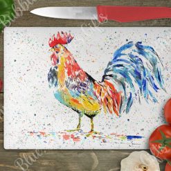 Cockerel with rainbow spots glass chopping board